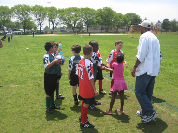 Young soccer players participating in an OUSC summer camp